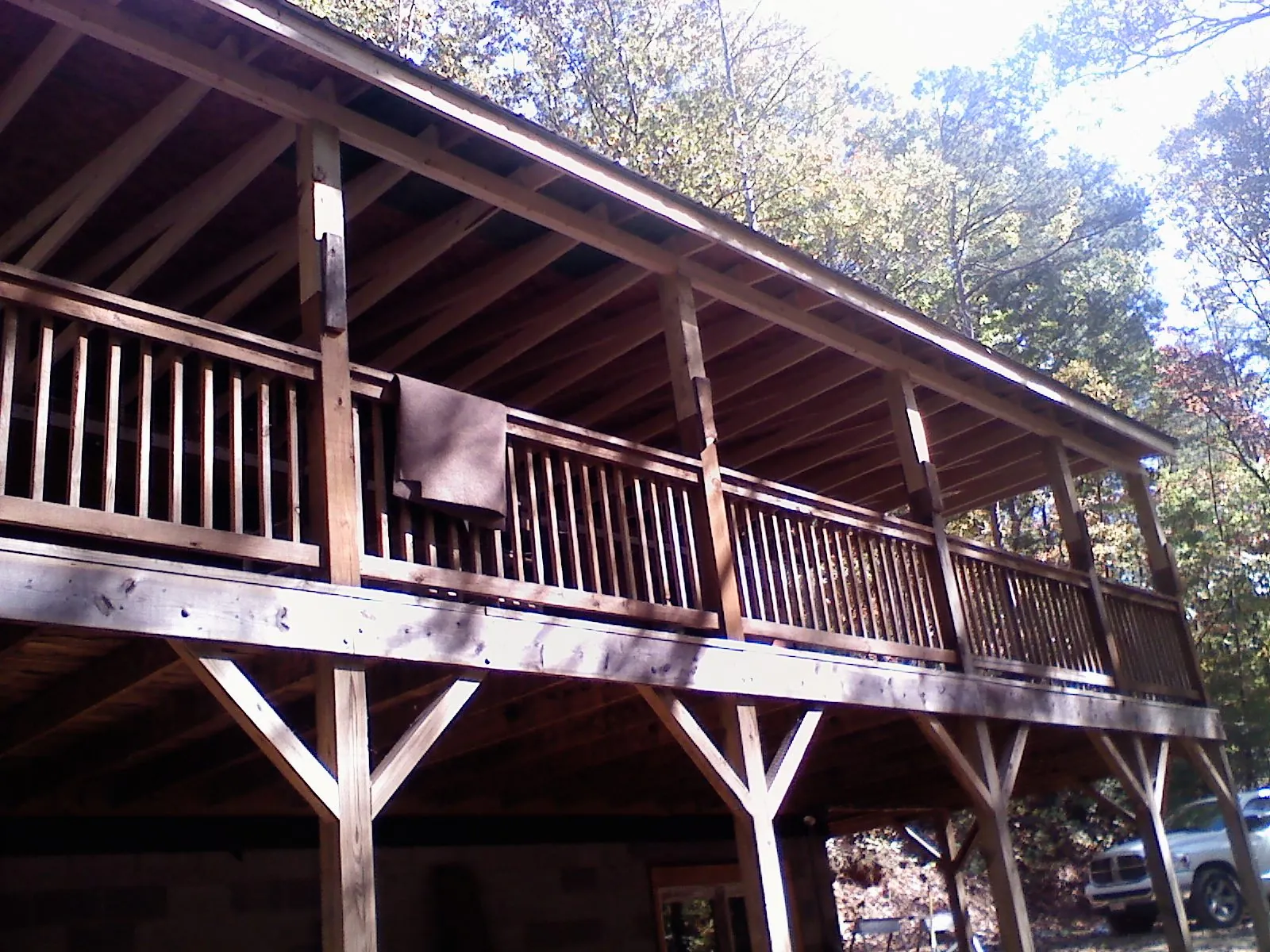 Timber framing under a new elevated porch and deck — Roof Leak Repair in Woodbury by Roofing Brothers